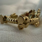 La Petite Dragonne wearring a Collar / 18K Gold Ring & Standing Sculpture