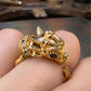 La Petite Dragonne wearring a Collar / 18K Gold Ring & Standing Sculpture