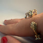La Petite Dragonne wearing Earrings / 18K Gold Ring & Standing Sculpture