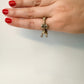La Petite Dragonne wearing Earrings / 18K Gold Ring & Standing Sculpture