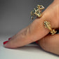 La Petite Dragonne wearing Earrings / 18K Gold Ring & Standing Sculpture