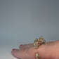 La Petite Dragonne wearing Earrings / 18K Gold Ring & Standing Sculpture
