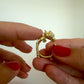 La Petite Dragonne wearring a Collar / 18K Gold Ring & Standing Sculpture